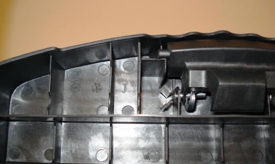 "J" is stamped on the underside of the top step, left of the locking mechanism