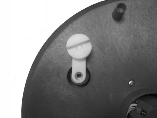 Recalled incubators have a crank arm that snaps into place. The crank arm is not connected by a screw