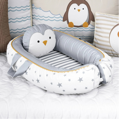 Nido para bebé con estrellas y pingüino retirado del mercado, SKU 138571