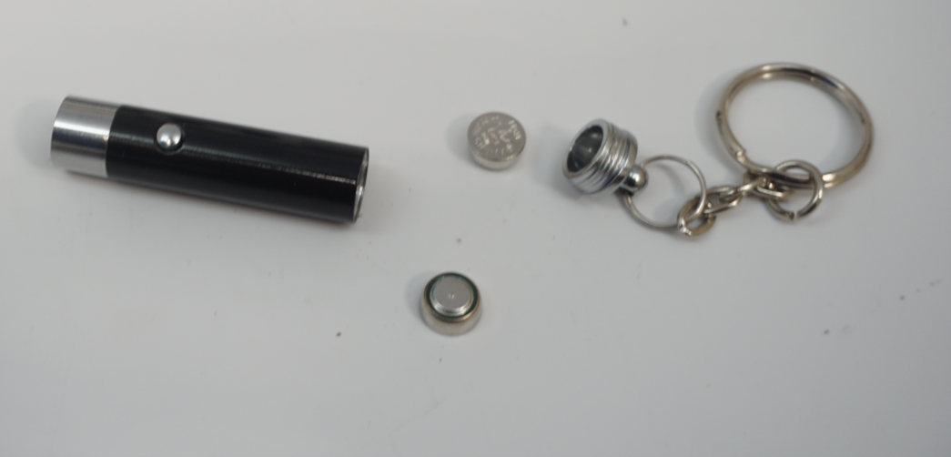 Recalled Anzmtosn Luminous Fidget Spinner Ball Mini Flashlight with batteries removed