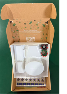 The delivery box's white tray of the recalled Autobrush Kids Sonic Pro Children's Toothbrush has a speaker with a coin cell battery on the underside