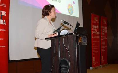 Arlene Flecha, CPSC official speaks at Furniture Seminar. 