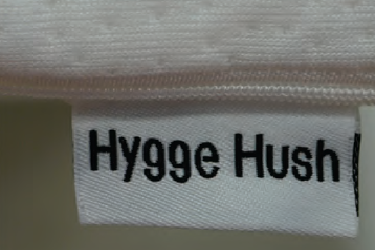 Tag with Hygge Hush Brand Name