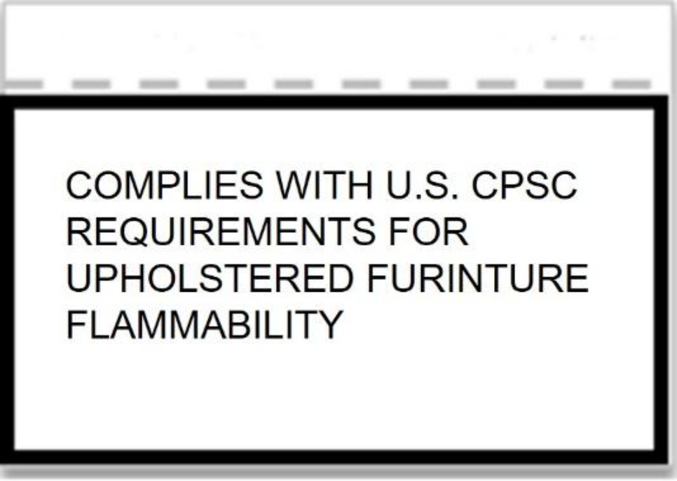 A label with black text on a white background states "COMPLIES WITH U.S. CPSC REQUIREMENTS FOR UPHOLSTERED FURNITURE FLAMMABILITY" in the center. The label is surrounded by a thick black border.