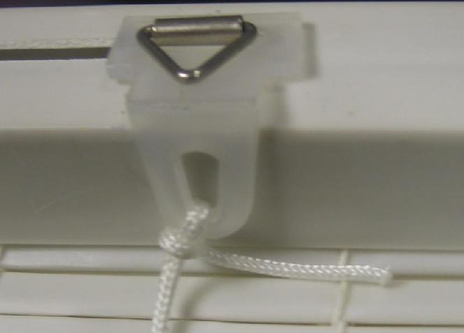 Oval Roll-up Blinds and Woolrich Roman Shades