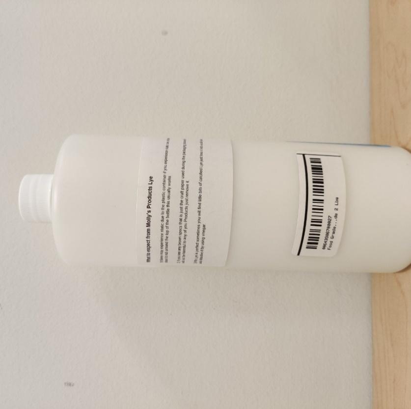 Reverso de la botella de dos libras (32 OZ) del producto de hidróxido de sodio de Mollys Products