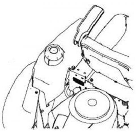 Model and serial number located behind the mower seat