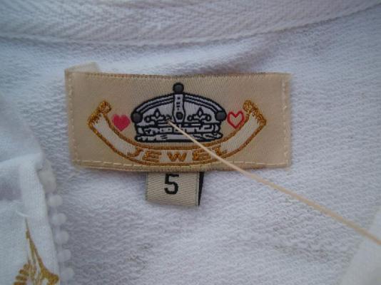 Picture of Neck Tag on Recalled Hooded Sweatshirt