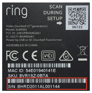 The model and serial number are printed on a label on the back of the doorbell. 