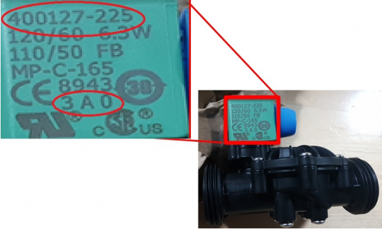 Recalled valve kit with product number displayed at the top of the green coil component and date code printed at the bottom