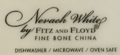 Label on the underside of the Fitz and Floyd Nevaeh White Can Mug   