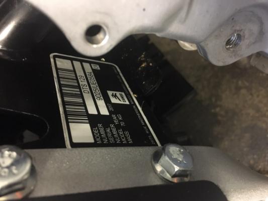 Recalled kit showing model and serial number on front right side of the undercarriage