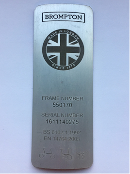 Metal plate featuring 6 digit frame number