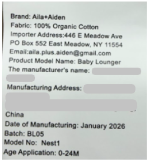 “Aila+Aiden,” “Baby Lounger” and “Model No: Nest1” are printed on a label stitched on the outside of the baby lounger’s cover.