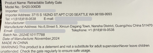 “Retractable Safety Gate” and model number “SH20.006DB” are printed on a white label stitched to the mesh fabric of the recalled safety gate