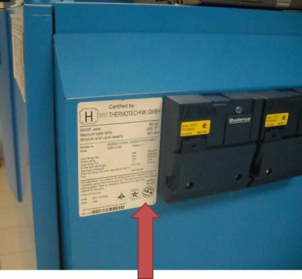 Recalled Gas Boiler with arrow indicating rating plate
