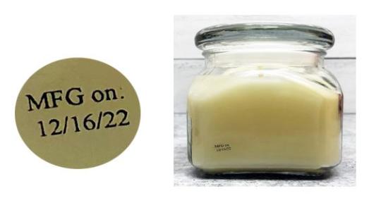 Candles with a Lot Code/MFG sticker on the back of the candle (in photo) are not included in this recall.