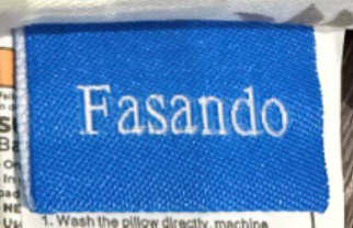 “Fasando” is printed on a label stitched on the outside of the baby lounger’s cover.