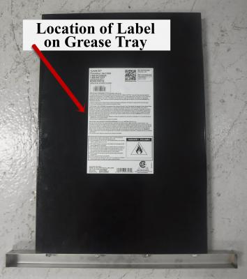 Label on underside of grease tray