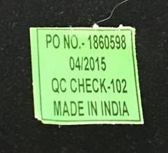 Green sticker affixed to the back of the mirror 