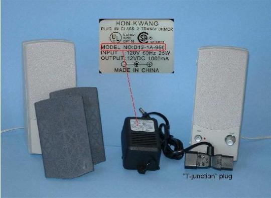 Recalled speaker power adapter included in HP P1534A External Amplified Speaker set