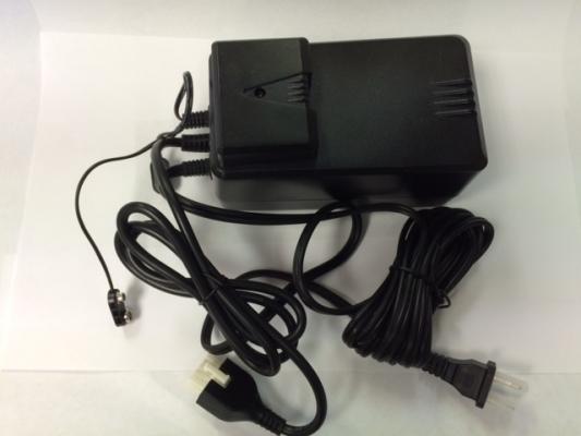Power supply with cover attached