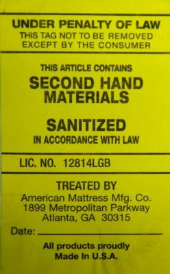 Yellow label on recalled American Mattress Manufacturing mattresses