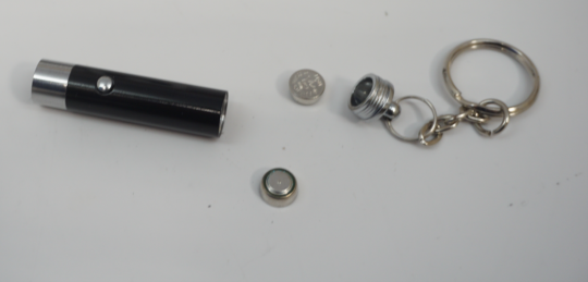 Recalled Anzmtosn Luminous Fidget Spinner Ball Mini Flashlight with batteries removed