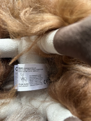 “INKARI” is printed on a label attached to the underside of the recalled plush toy.