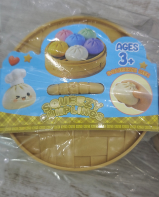 Recalled GIHNJSI Squeezy Dumplings packaging with removable label - front