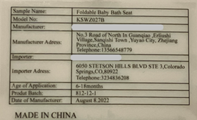 “Foldable Baby Bath Seat” and “Model No: KSWZ027B” on the tracking label under the seat