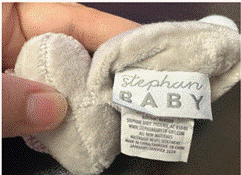 “Stephan BABY” is printed on a sewn-in label of the recalled toys’ cube.
