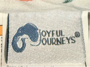 “Joyful Journeys” can be found on a tag stitched on the outside of the lounger cover