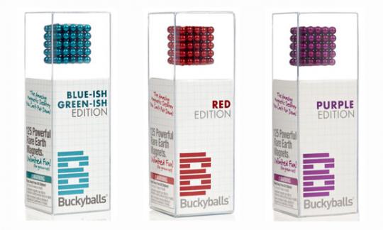 Buckyballs magnet sets in blue-ish green-ish, red and purple