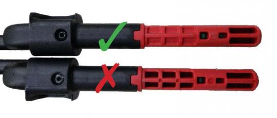 Adaptors: Recalled adaptors have 10 holes in the bottom of the red portion.