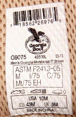 Label inside the shoe’s tongue showing product number and date code.