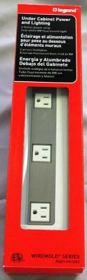 Recalled Legrand Wiremold under-cabinet power strip in the red packaging.