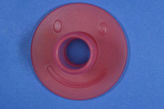 Smiley Face on the top of the base of PouchPop Topper