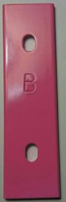Pink bar with lead in the surface coating.