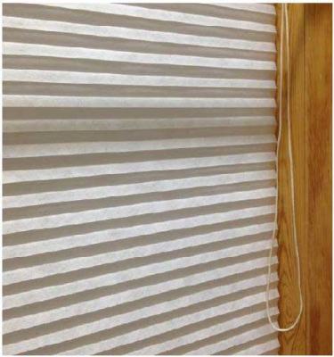 Recalled Carra Imports cellular shade with a continuous loop cord