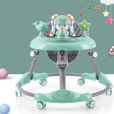 Recalled Zeno infant walker with gray frame, gray seat, teal tray and toy attachments