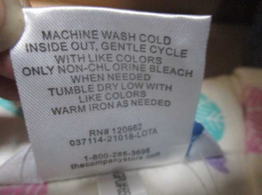 The Company Store, RN#120962, 037114-21018-LOT and style 65002B are printed on a sewn-in neck label.