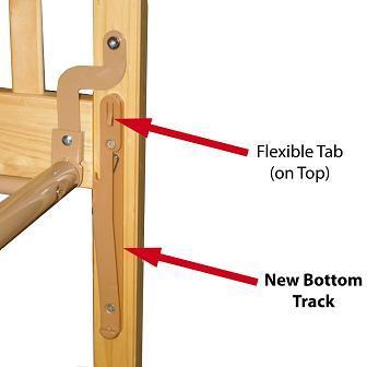 Flexible tab (on top) and new bottom track on recalled crib