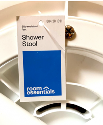 The Room Essentials logo and item number 064-20-1091 are printed on the front of the recalled shower stool’s hangtag.