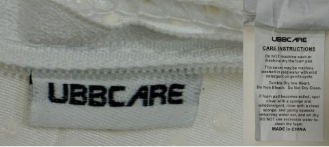 Recalled UBBCARE Play Yard Mattress tag and instructions