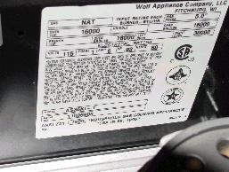 Recalled Wolf residential gas range sticker with serial number