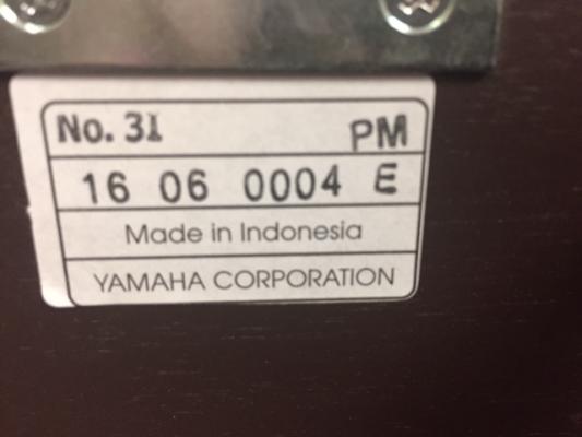 Closeup of label on piano bench