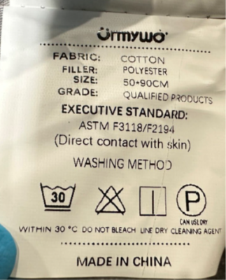 Label with “URMYWO” brand name on side of recalled baby lounger