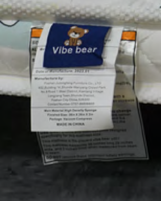 Blue tag with cartoon teddy bear