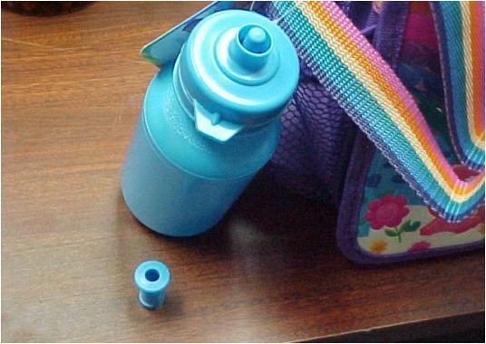 Recalled water bottle that came with Care Bears Lunch Kit bag